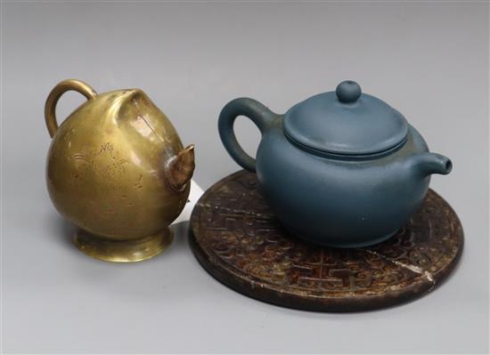 A blue Yixing teapot with seal mark, a soapstone bi and a 19th century Chinese bronze water dropper in the form of a Cadogan teapot